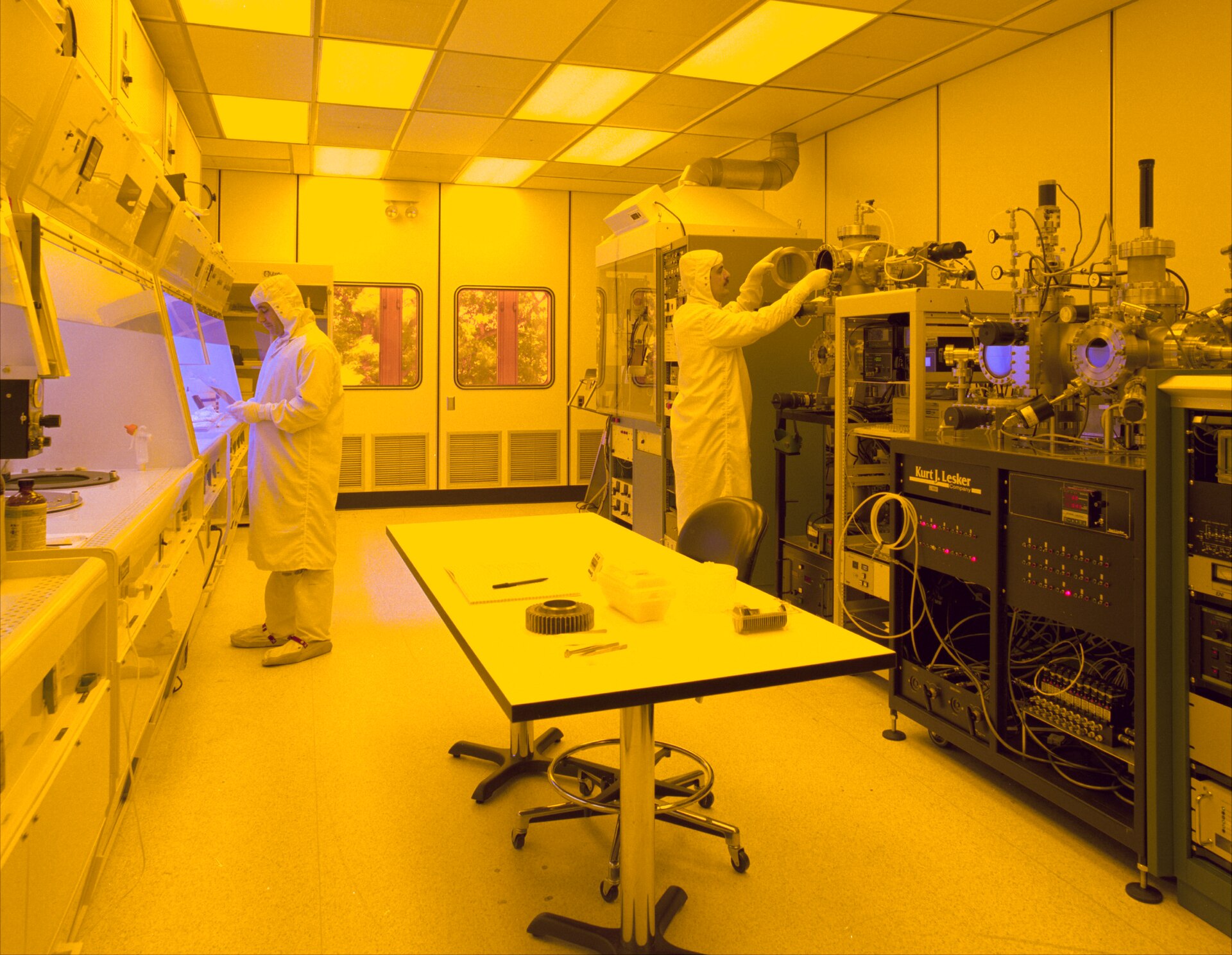 GlobalFoundries’ New York Expansion Draws Up to $21 Billion From Japan Cleanroom engineer working on semiconductor wafers at a chip factory